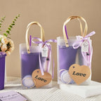 56Pcs Baby Shower Prizes for Game Winners Baby Shower Favors Gifts including Plastic Tumbler Notebook Scented Candles Ballpoint Pen Mirrors with Hair Brushes Bracelet Gift Bag (Purple) - Image 2