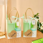 56Pcs Baby Shower Prizes for Game Winners Baby Shower Favors Gifts including Plastic Tumbler Notebook Scented Candles Ballpoint Pen Mirrors with Hair Brushes Bracelet Gift Bag (Green) - Image 4