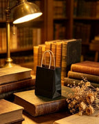 qiqee 600-Packs Black Paper Gift Bags with Handles Bulk 4.5"x2.5"x6" Mini Size Paper Bags Multiple Uses - Image 6