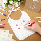 Panitay 100 Pcs DIY Baby Bibs Decorating Kit 50 White Bibs 25 Stencils 24 Markers 1 Baby Shower Game Sign - Image 3