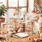 Reallnaive 6 Set Coffee Themed Baby Shower Game Prizes for Player Winners Tumblers with Lids Straws Roller for Face Pens Spiral Notebooks Gift Bags for a Baby Is Brewing Shower Guests Game Favors - Image 5