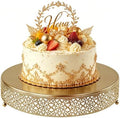 14 Inch Luxury Gold Cake Stand, Round Metal Dessert Display with Ornate Filigree Lace, Dual‑Coated Premium Finish for Wedding, Anniversary & Elegant Home Decor by FEICTPOX