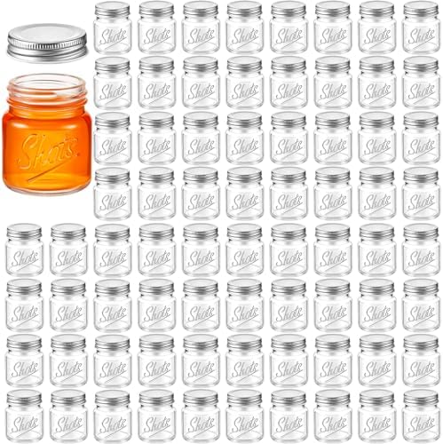 Tessco for you Mini Mason Jar Shot Glasses with Lids 2 oz Dishwasher Safe Mason Canning Jars for Bachelorette Wedding Party Favors Bar Drinks Home Desserts Honey Jam Candy(Clear,72 Pcs) by Tessco